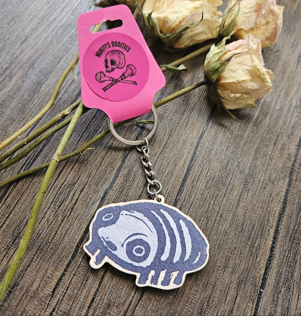 Tim the terrified pill bug keyring