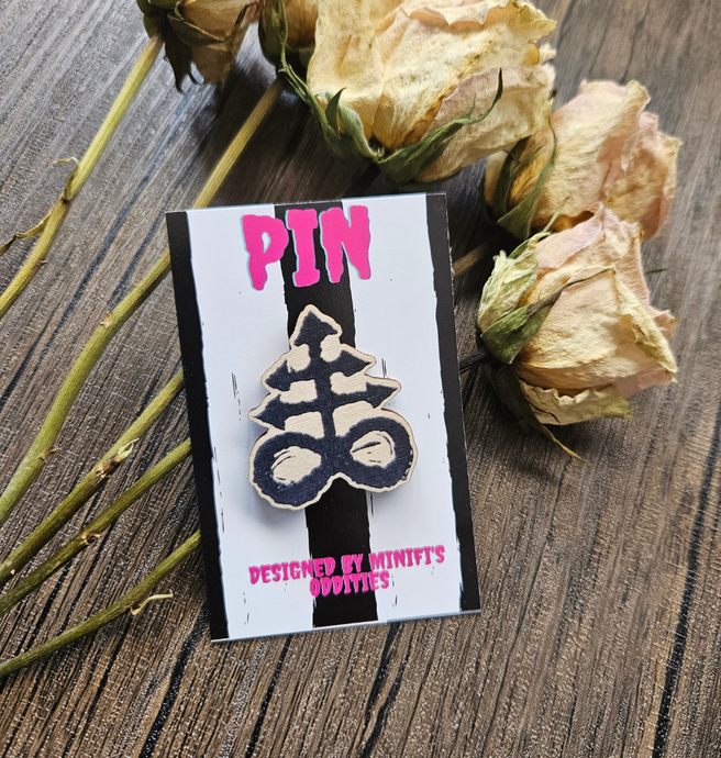 Leviathan cross wooden badge