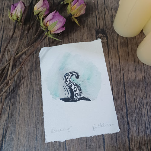 Reaching - lino print