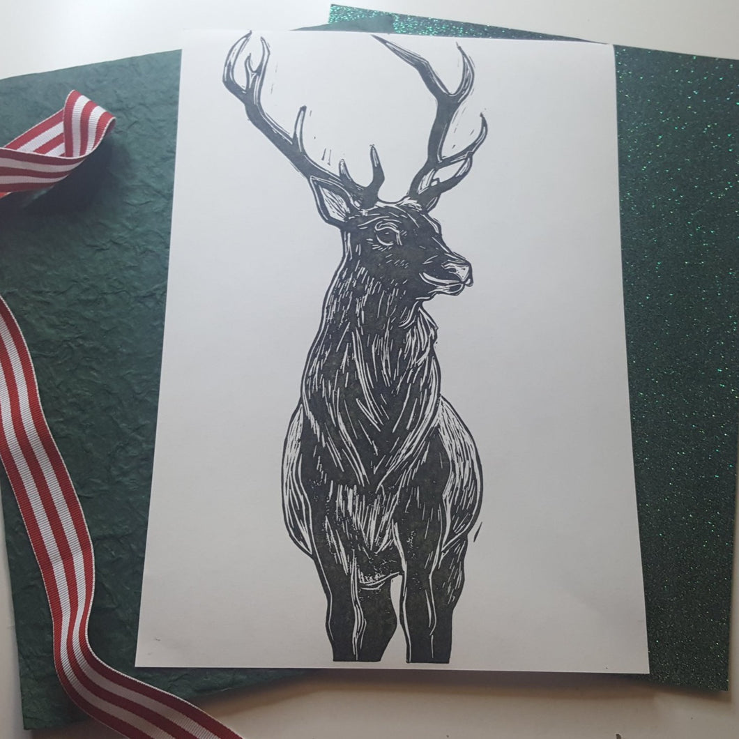 Stag lino print. Black with gold flecks